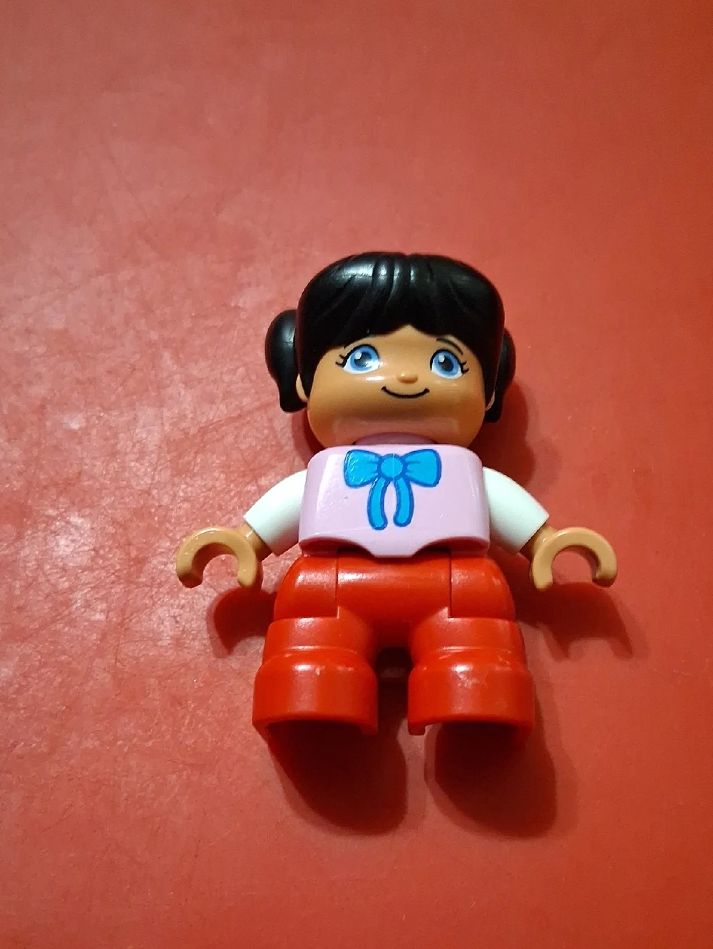 Kid Lego Duplo Figure - Pink Top with Blue Bow and Red Pants